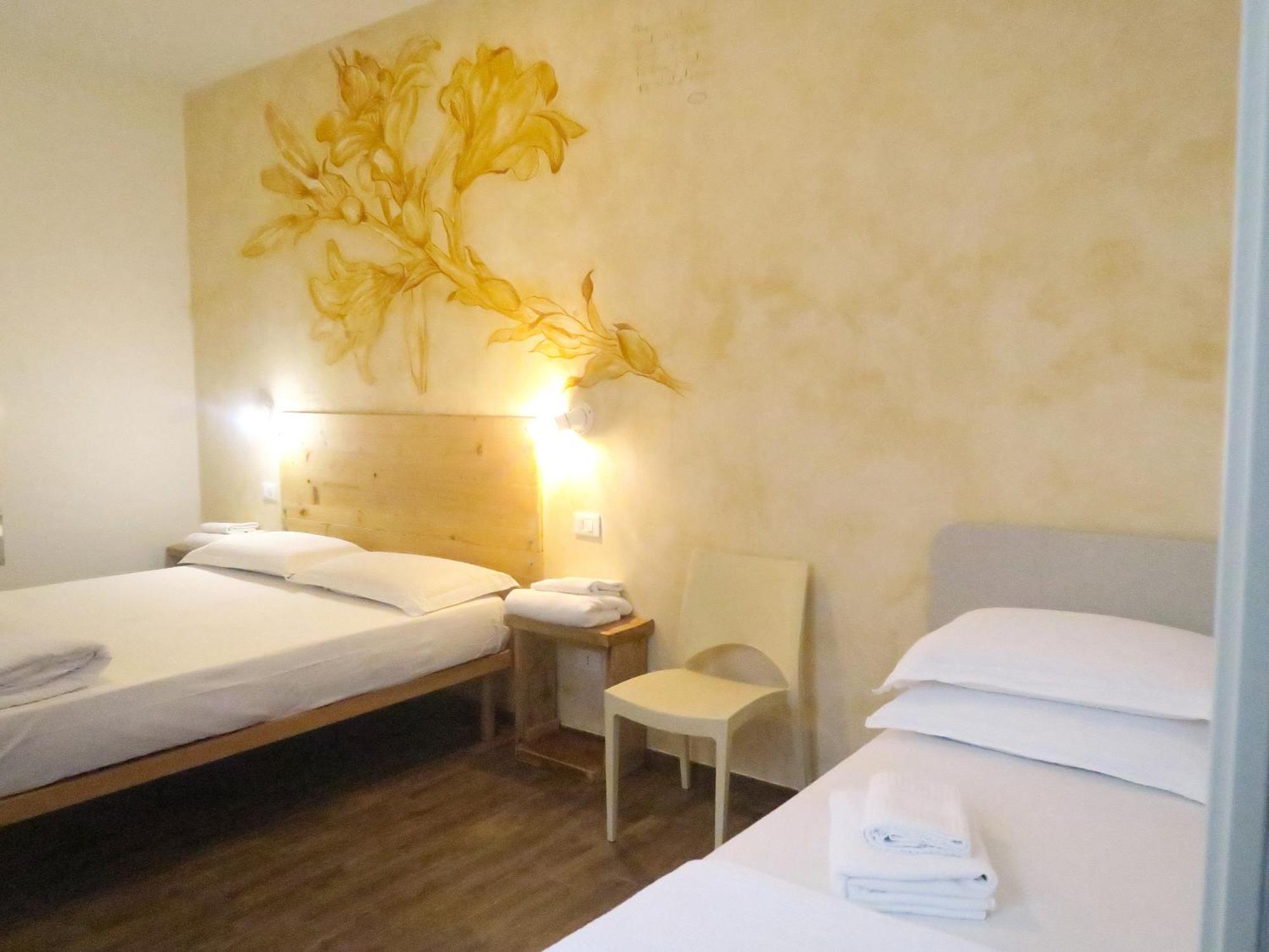 Oasi Da Vinci Aparthotel ติญญาเล ภายนอก รูปภาพ